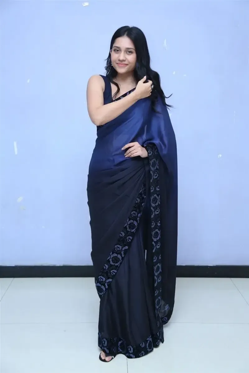 INDIAN ACTRESS RICHA JOSHI STILL IN BLUE SAREE AT MADHI MOVIE TRAILER LAUNCH 8